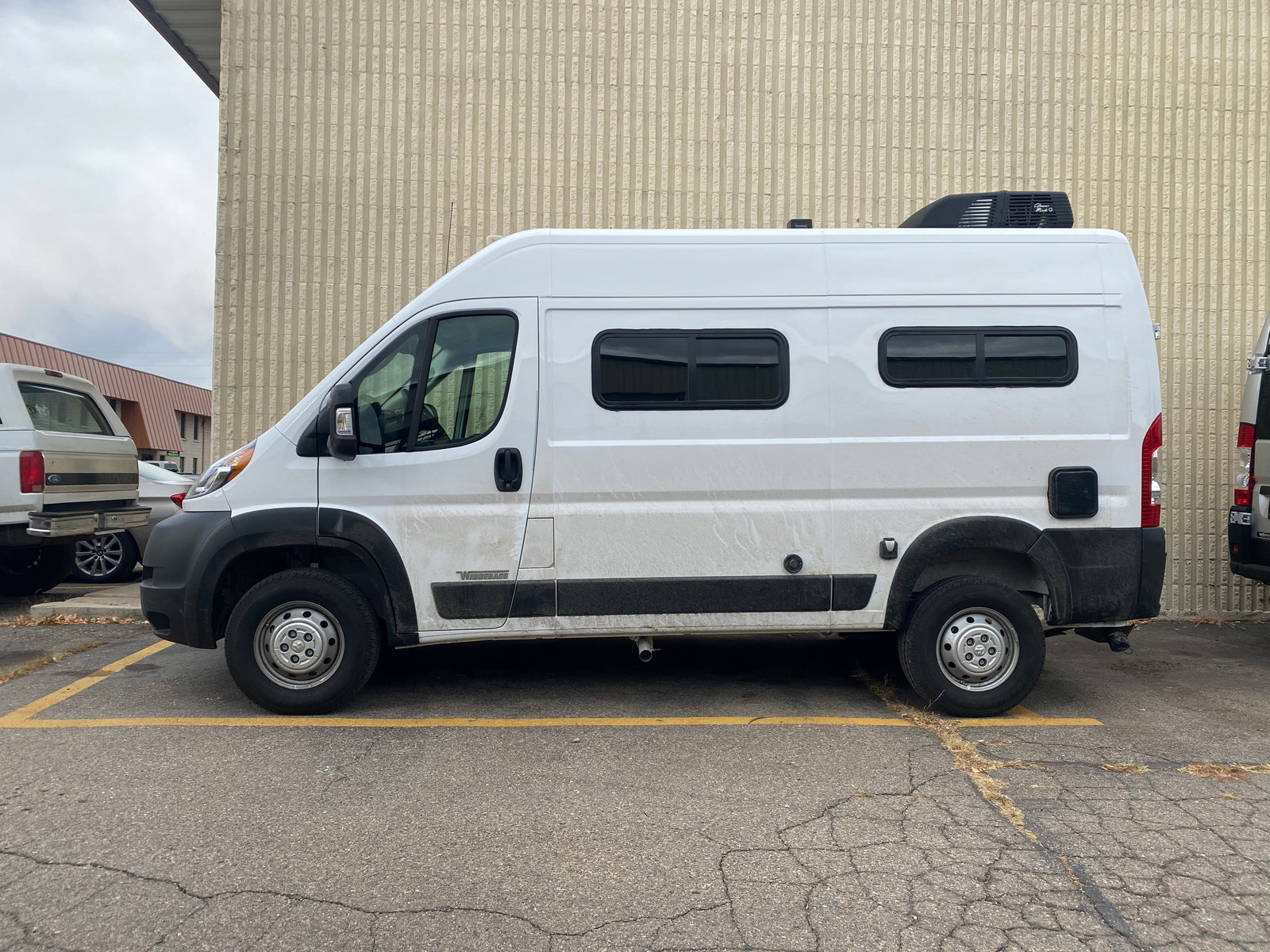 Lifted Ram ProMaster van with exterior upgrades