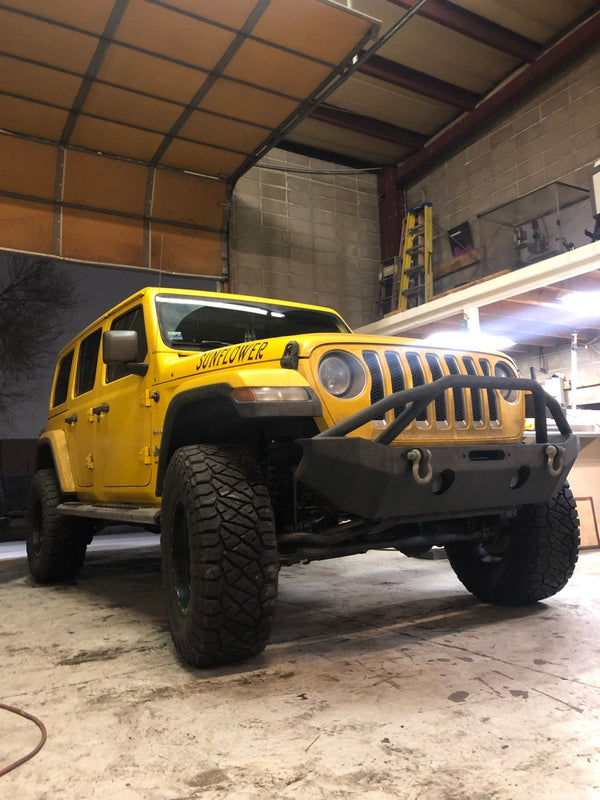 Jeep Wrangler Sahara: A Rattle Traced to Untorqued Shock Bolts