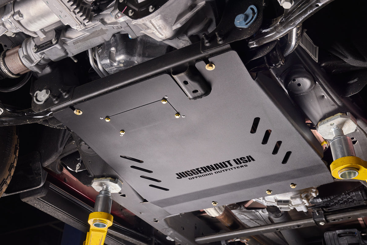 2019-2026 Chevy Silverado 1500 Transmission Skid Plate & Cat Shield — CNC-cut 1/4 inch aluminum, made in Colorado by Juggernaut USA (view 2)