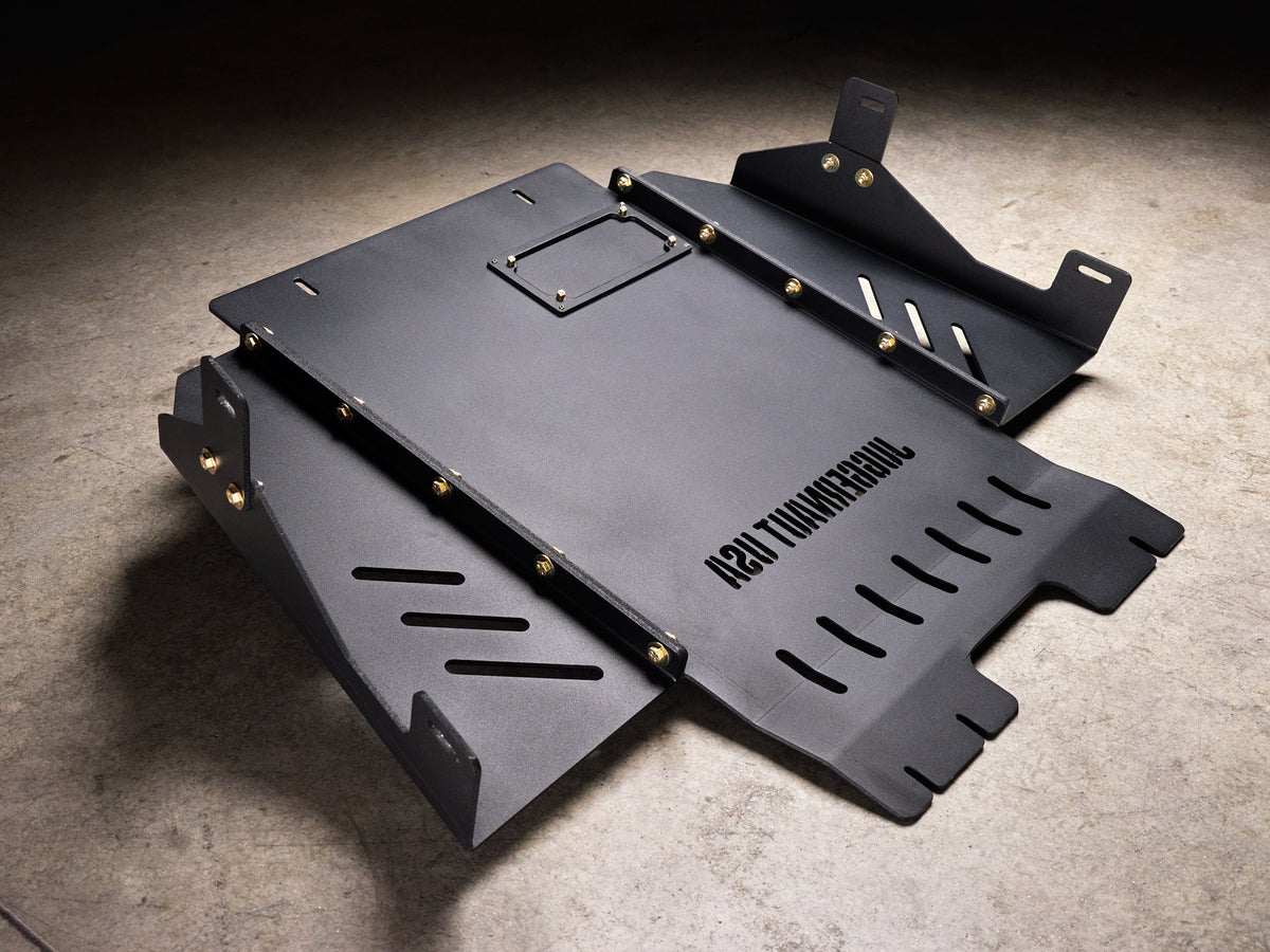 2017-2026 Ford F-150 Raptor Transmission Skid Plate — CNC-cut 1/4 inch aluminum, made in Colorado by Juggernaut USA (view 2)
