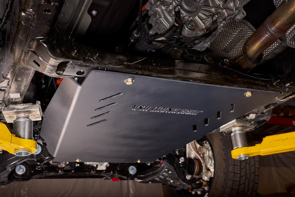2024-2026 Toyota Tacoma transmission skid plate — 1/4 inch aluminum covering transmission pan and sway bar disconnect — additional view