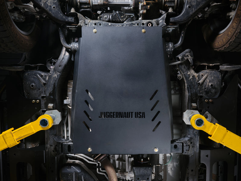 Juggernaut USA transmission skid plate installed under a Toyota Land Cruiser