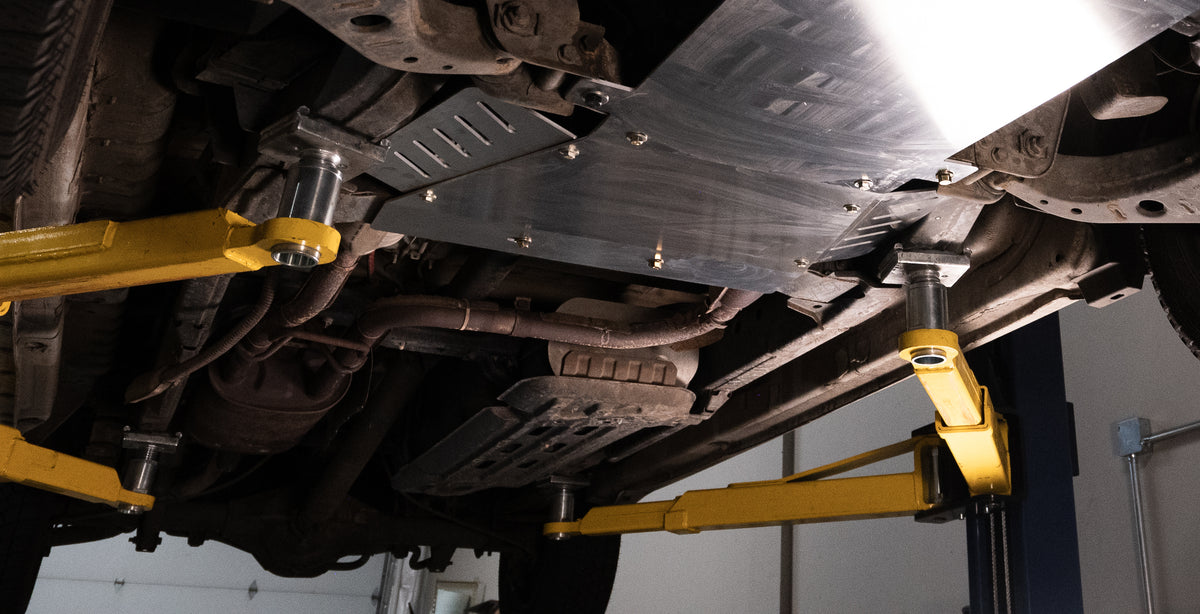 2011-2021 Nissan NV1500/NV2500/NV3500 Transmission Skid Plate & Cat Shield — CNC-cut 1/4 inch aluminum, made in Colorado by Juggernaut USA