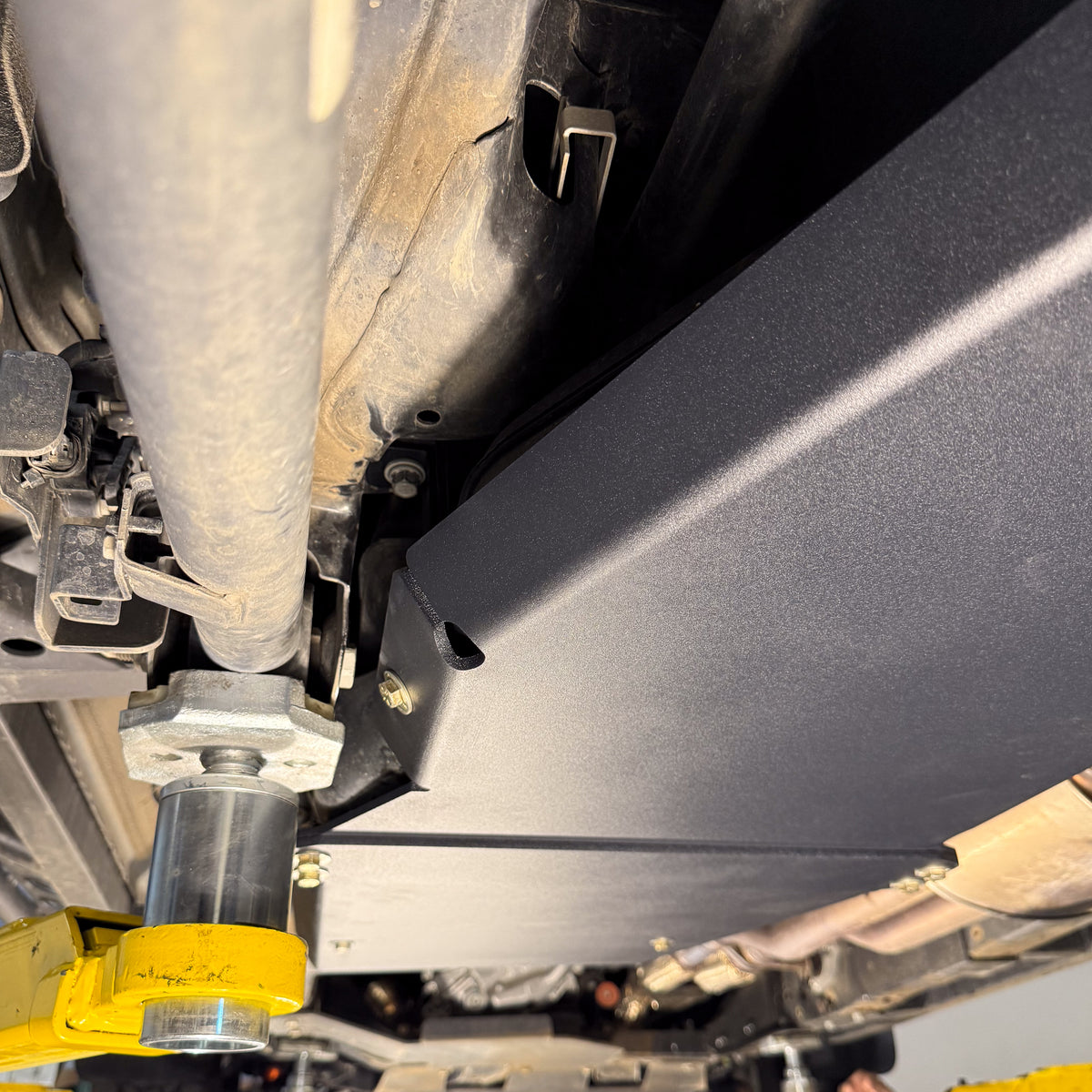 2024-2026 Ford Ranger Raptor Fuel Tank Skid Plate — CNC-cut 1/4 inch aluminum, made in Colorado by Juggernaut USA (view 4)