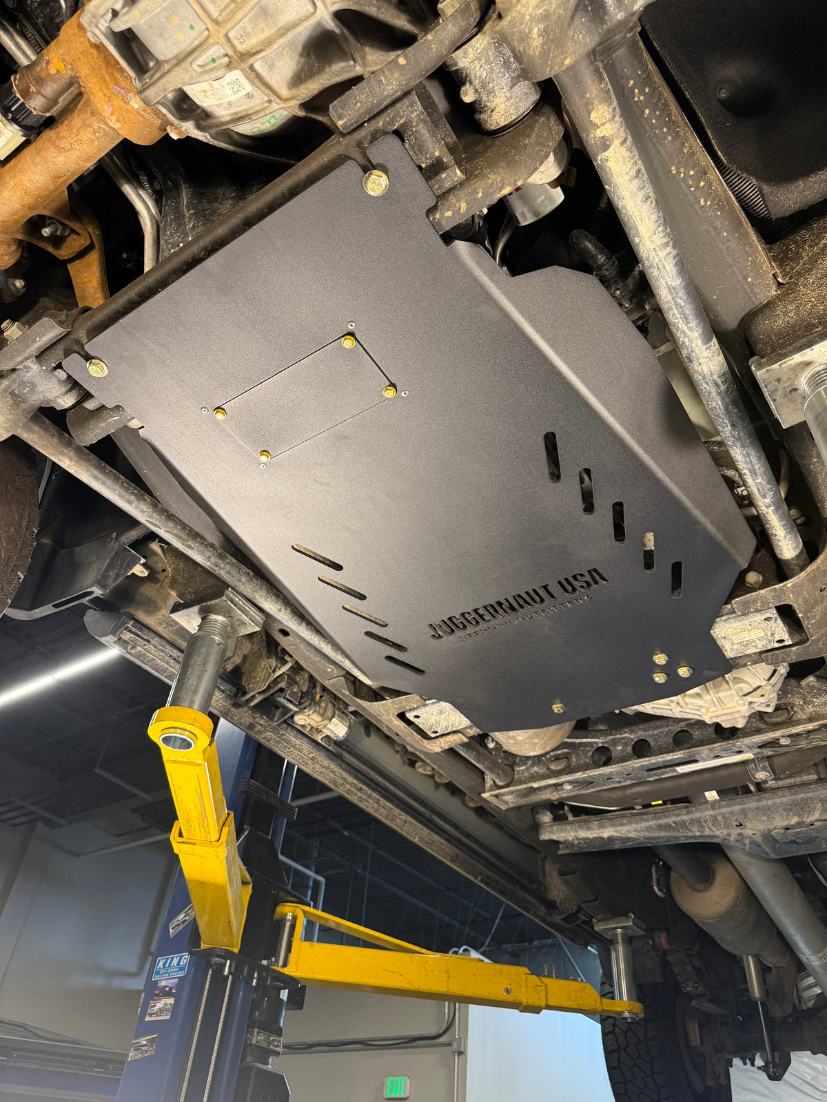 2020-2026 Chevy Silverado 2500HD/3500HD Transmission Skid Plate & Cat Shield — CNC-cut 1/4 inch aluminum, made in Colorado by Juggernaut USA (view 4)