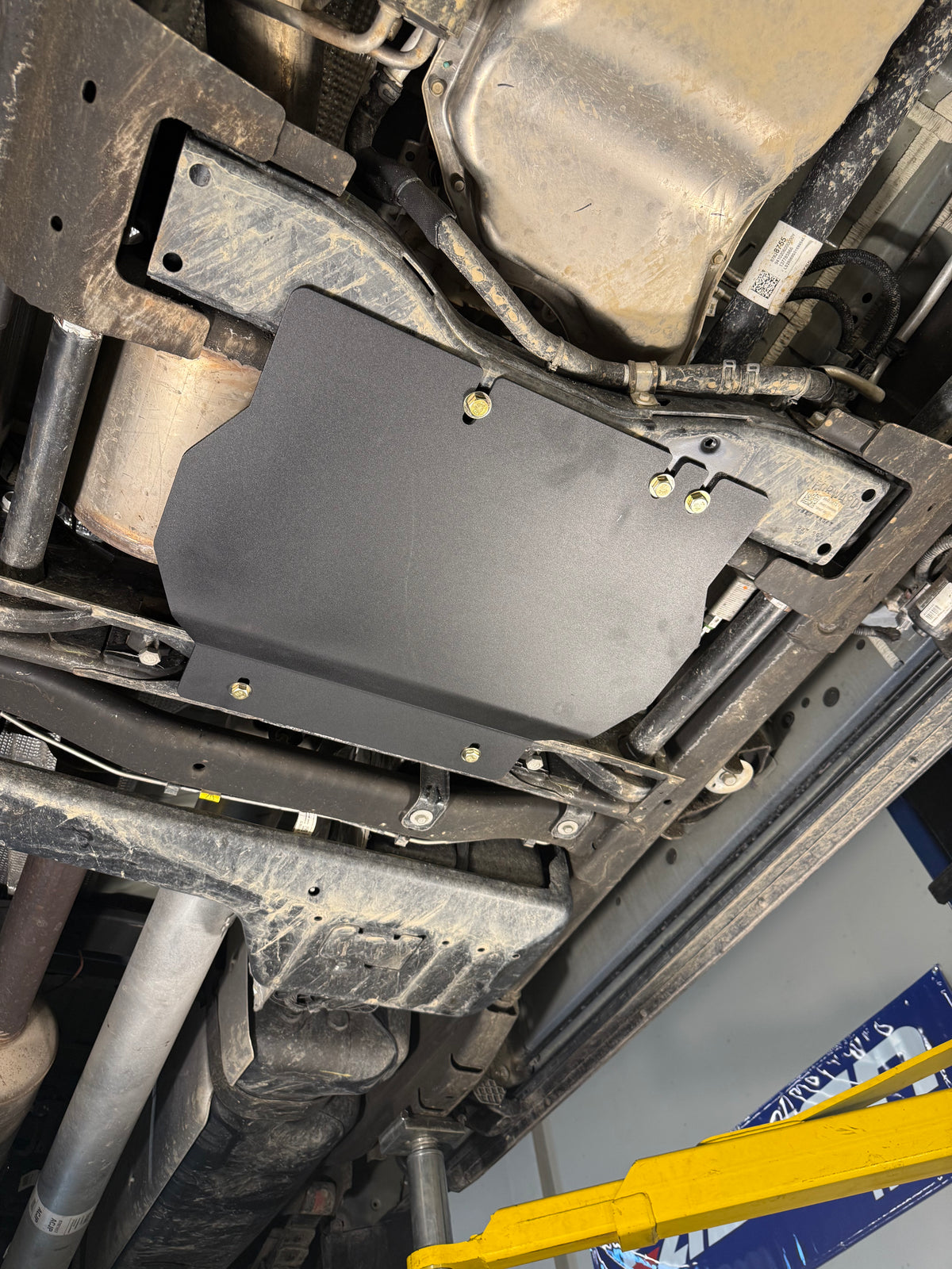 2020-2026 Chevy Silverado 2500HD/3500HD Transfer Case Skid Plate / GMC Sierra 2500HD/3500HD Transfer Case Skid Plate — CNC-cut 1/4 inch aluminum, made in Colorado by Juggernaut USA (view 2)