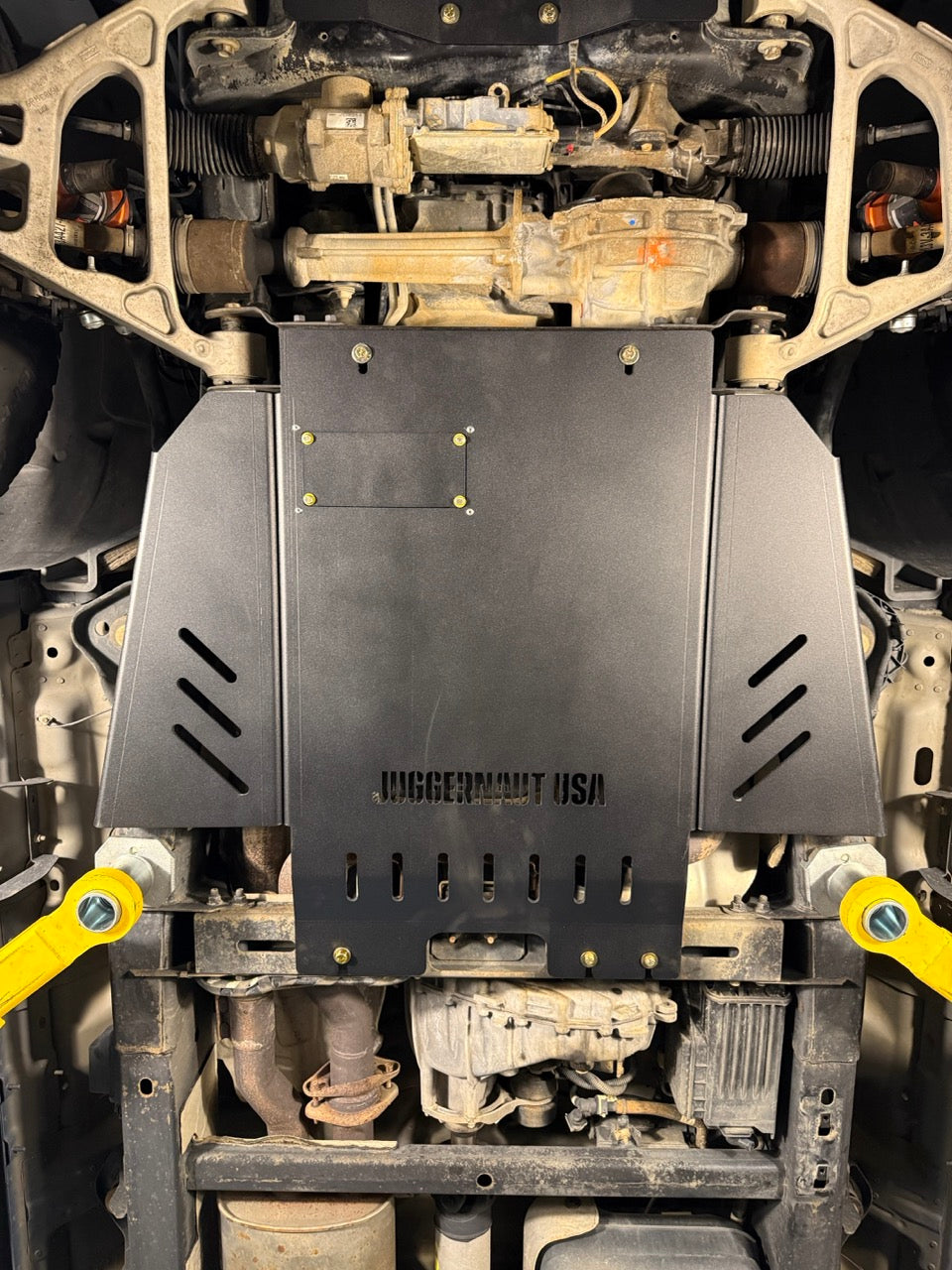2017-2026 Ford F-150 Raptor Transmission Skid Plate — CNC-cut 1/4 inch aluminum, made in Colorado by Juggernaut USA (view 3)